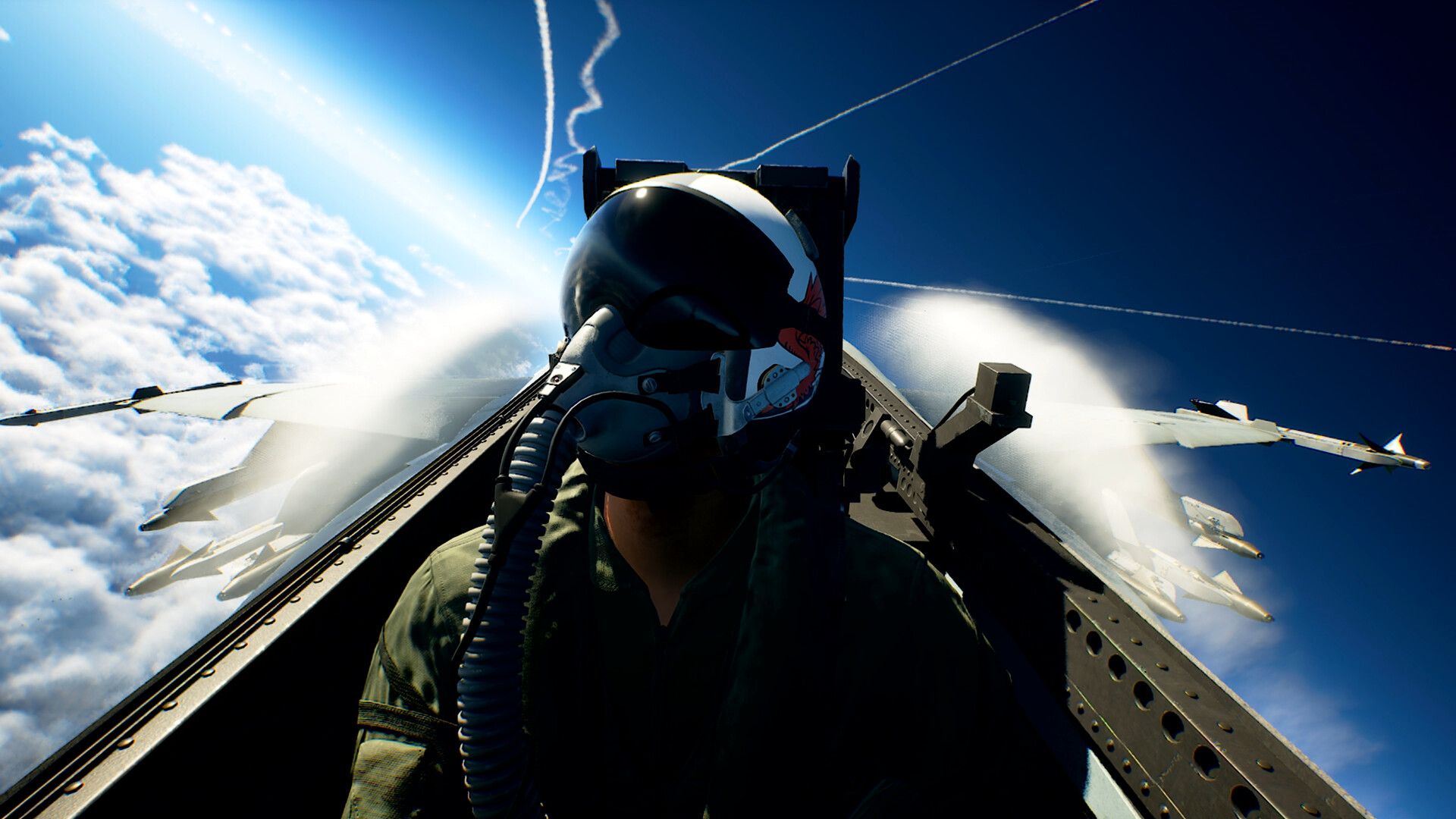 A helmeted pilot faces the camera in a fighter cockpit above clouds, with missiles mounted on the wings.