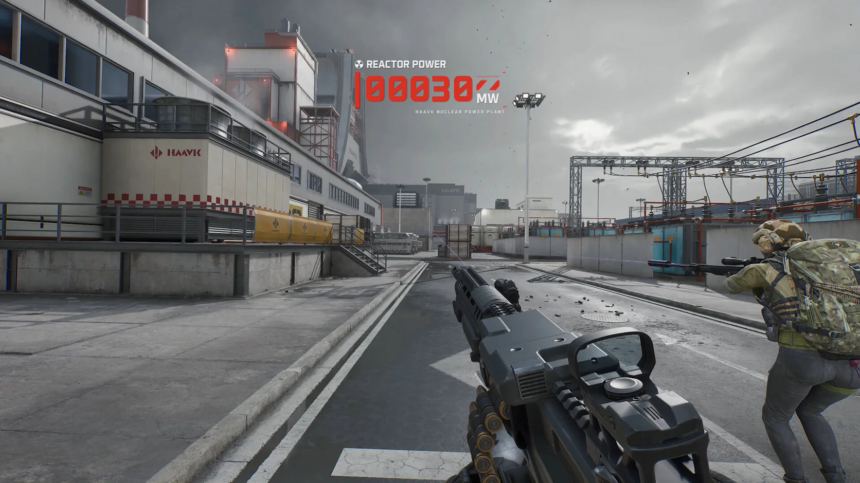 Delta Force gameplay showing a player and teammate moving through a nuclear power plant