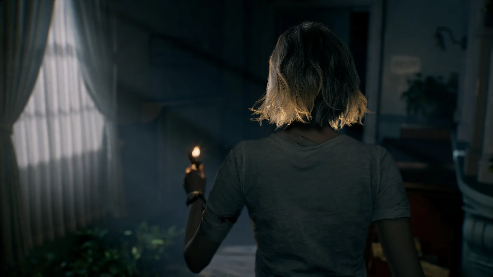 Resident Evil Requiem gameplay showing Grace Ashcroft exploring a dark room with a lighter
