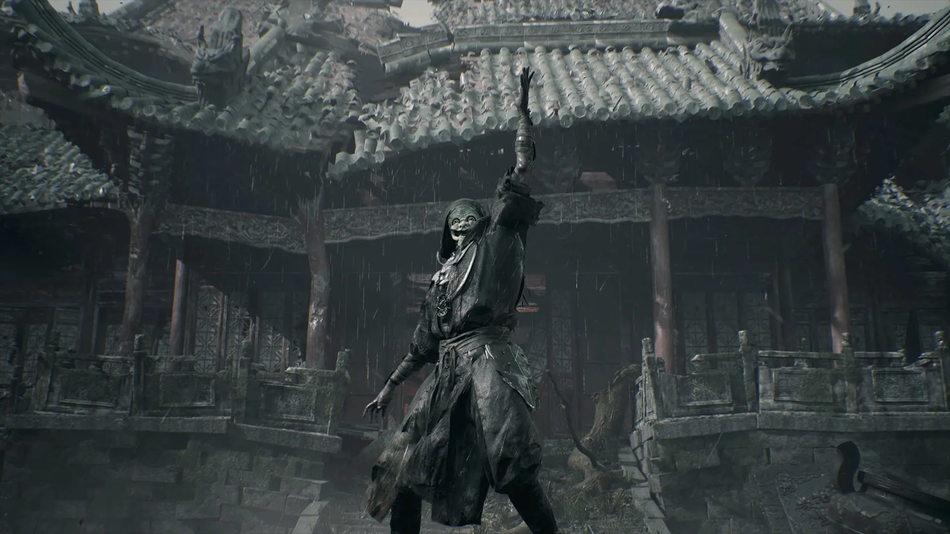 A dark-clothed masked figure raises a blade in a rain-soaked courtyard.