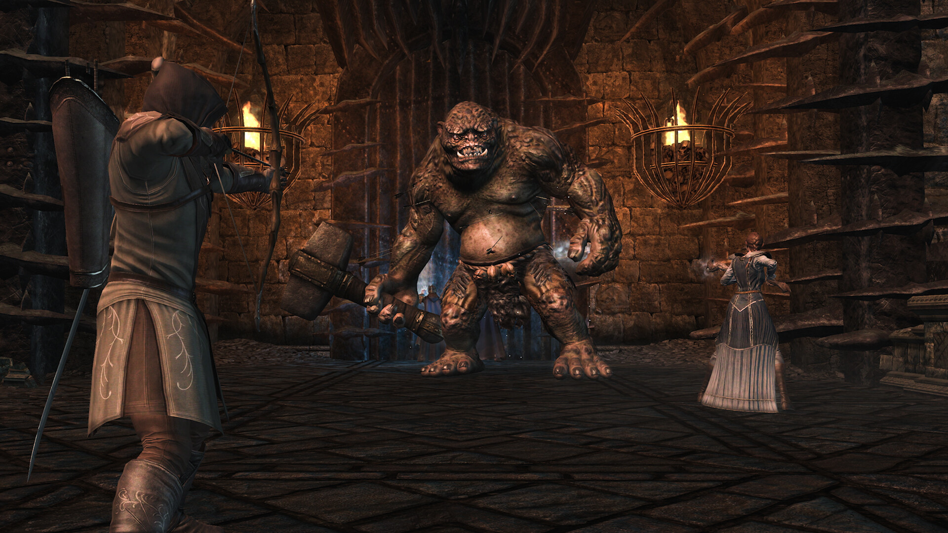 War in the North Legacy Edition fellowship fighting a troll in a torchlit hall